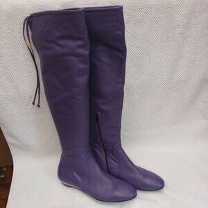 Pair of leather aubergine tall boots. New and Unworn.